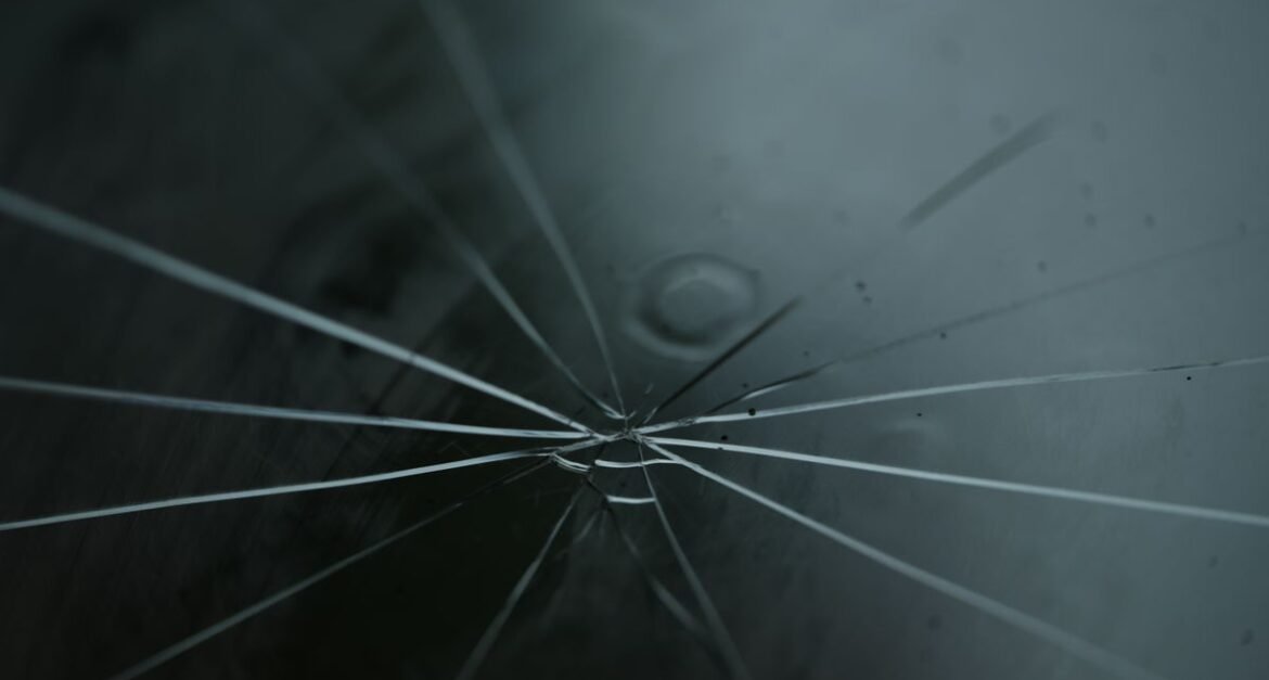 Cracked windshield on a car in Pittsburgh, PA that may need repair or replacement