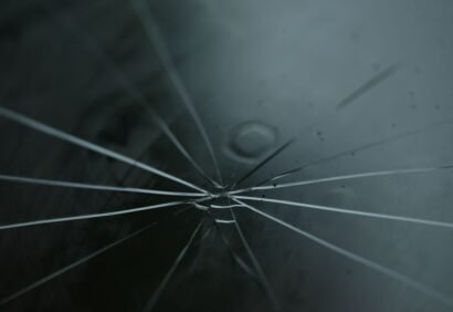Cracked windshield on a car in Pittsburgh, PA that may need repair or replacement